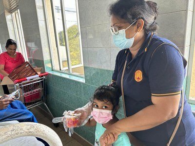 A compassionate act by the Duke-Ruhuna Office staff; alms to the Cancer Ward, Teaching Hospital Karapitiya. image 1